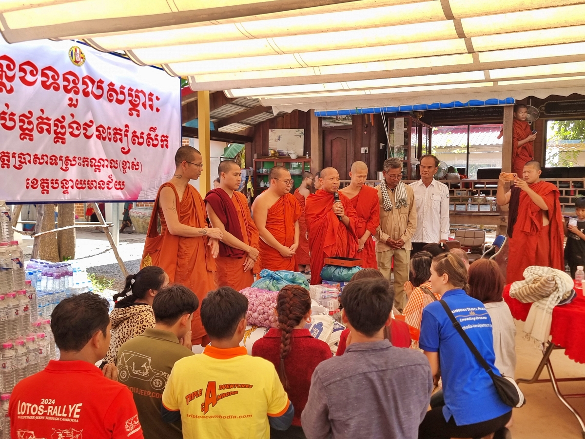 Monks blessing Wat Kchass